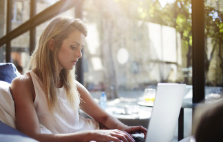 A women practicing in laptop